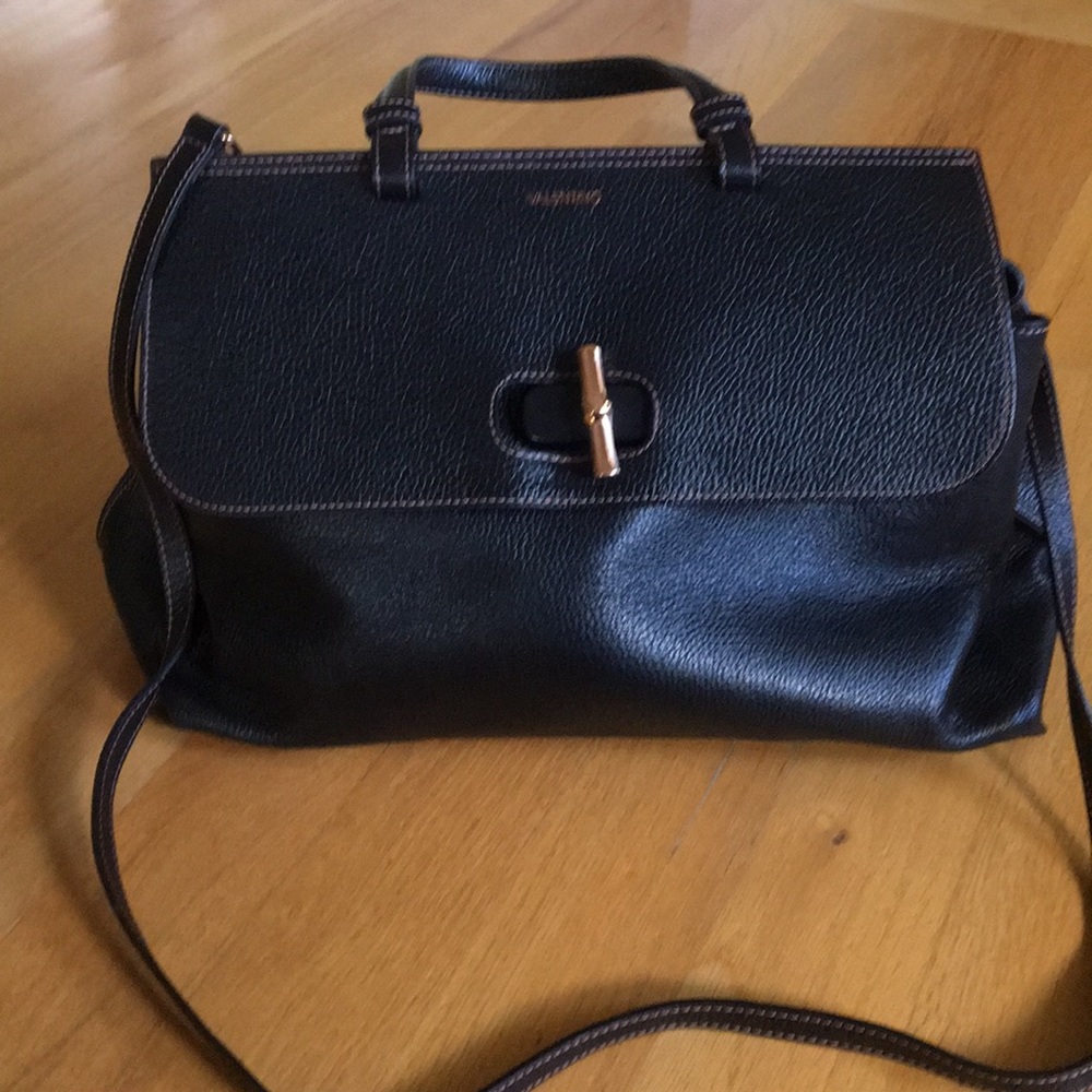 Valentino by Mario comes with the strap
